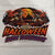 Cut Halloween Havoc DTF transfer on its film